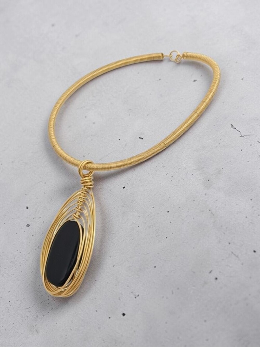 Sassified Boutique Nwt Gold Wire Wrapped Necklace with Black Pendant.